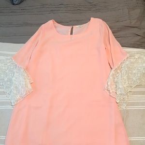 Size medium kori dress with lace on the sleeves.